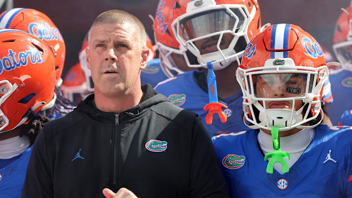 Sep 6, 2025; Gainesville, Florida, USA; Florida Gators head coach Billy Napier and teammates run out of the tunnel prior to the game against the South Florida Bulls at Ben Hill Griffin Stadium. Mandatory Credit: Kim Klement Neitzel-Imagn Images