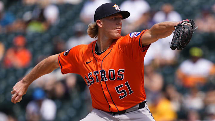  Houston Astros relief pitcher Jordan Weems (51) delivers a pitch in the sixth inning at Coors Field.