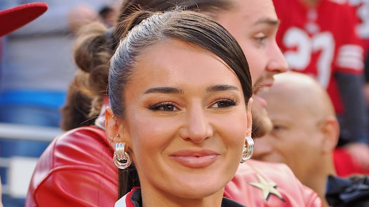 Jan 28, 2024; Santa Clara, California, USA; Kristin Juszczyk wears a custom made jacket in show of her support for her husband San Francisco 49ers fullback Kyle Juszczyk (not pictured) before the NFC Championship football game against the Detroit Lions at Levi's Stadium. Mandatory Credit: Kelley L Cox-Imagn Images