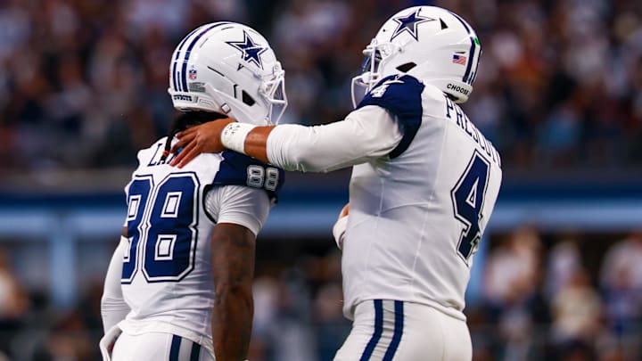Oct 19, 2025; Arlington, Texas, USA; Dallas Cowboys wide receiver Ceedee Lamb (88) celebrates with Dallas Cowboys quarterback Dak Prescott (4) after scoring a touchdown during the first quarter against the Washington Commanders at AT&T Stadium. Oct 19, 2025; Arlington, Texas, USA; Dallas Cowboys wide receiver Ceedee Lamb (88) celebrates with Dallas Cowboys quarterback Dak Prescott (4) after scoring a touchdown during the first quarter against the Washington Commanders at AT&T Stadium.