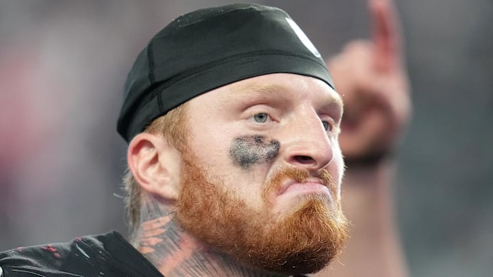 Dec 18, 2022; Paradise, Nevada, USA; Las Vegas Raiders defensive end Maxx Crosby (98) walks off the field after the Raiders defeated the New England Patriots 30-24 at Allegiant Stadium. Mandatory Credit: Stephen R. Sylvanie-Imagn Images
