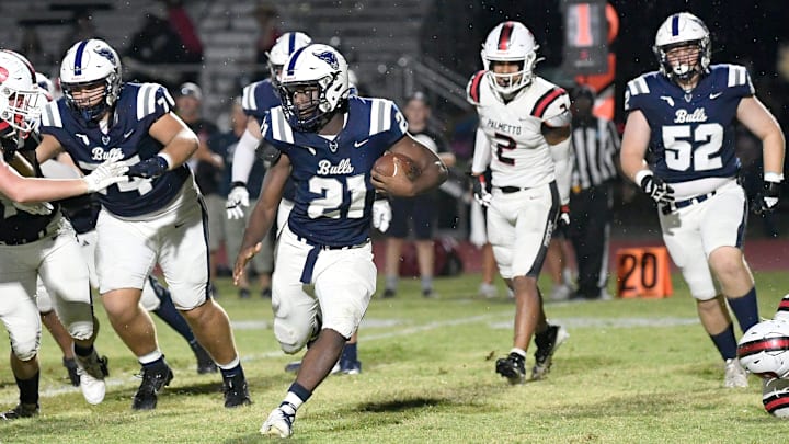 Bulls' running back Mar-Keyon Maxwell (#21). The Palmetto Tigers with a 21-14 win over the Parrish Community Bulls during the Class 6A-District 11 opener game Friday night, Sept. 13, 2024, in Parrish.