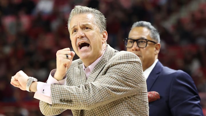 Arkansas Razorbacks coach John Calipari reacts to a non-call in the second half Wednesday against the Troy Trojans at Bud Walton Arena. Arkansas won 65-49 after trailing by a point at halftime. The Hogs play Monday against Pacific.
