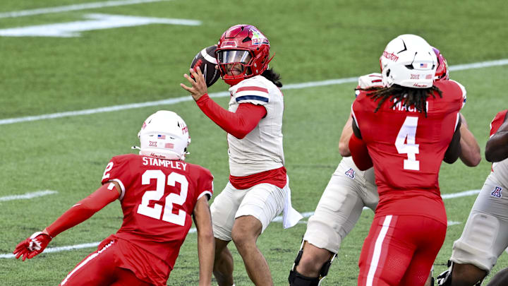 Oct 18, 2025; Houston, Texas, USA; Houston Cougars defensive back Marc Stampley II (22) applies pressure to Arizona Wildcats quarterback Noah Fifita (1) during the first quarter at TDECU Stadium. Mandatory Credit: Maria Lysaker-Imagn Images 