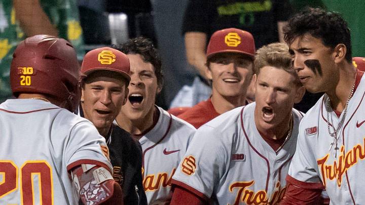 USC celebrates a home run by Isaac Cadena (20) as the Oregon Ducks host the USC Trojans on May 14, 2026, in Eugene, Oregon.