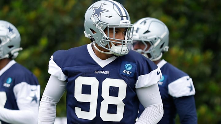 Jun 10, 2025; Arlington, TX, USA; Dallas Cowboys defensive end Payton Turner (98) goes through a drill during practice at the Ford Center at the Star Training Facility in Frisco, Texas. Mandatory Credit: Chris Jones-Imagn Images Jun 10, 2025; Arlington, TX, USA; Dallas Cowboys defensive end Payton Turner (98) goes through a drill during practice at the Ford Center at the Star Training Facility in Frisco, Texas. Mandatory Credit: Chris Jones-Imagn Images
