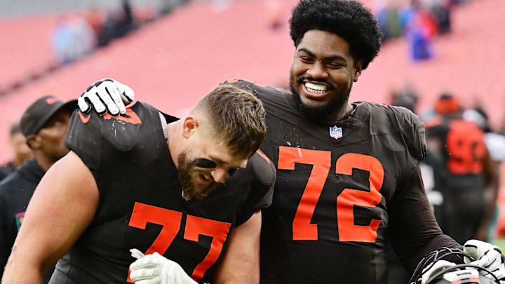 Oct 19, 2025; Cleveland, Ohio, USA; Cleveland Browns guard Wyatt Teller (77) and offensive tackle KT Leveston (72) celebrate after the Browns beat the Miami Dolphins at Huntington Bank Field. Mandatory Credit: Ken Blaze-Imagn Images