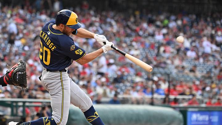 Aug 2, 2025; Washington, District of Columbia, USA; Milwaukee Brewers left fielder Brandon Lockridge (20) hits the ball into play against the Washington Nationals during the eighth inning at Nationals Park. Mandatory Credit: Rafael Suanes-Imagn Images