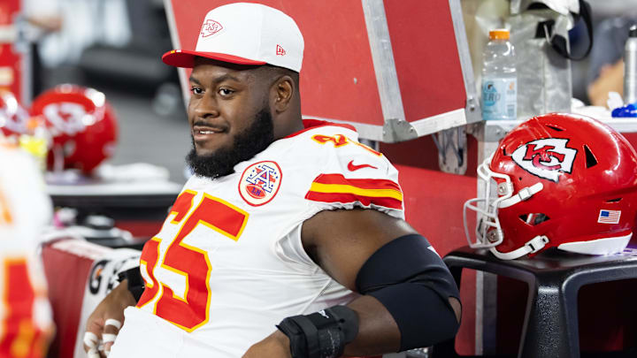Aug 9, 2025; Glendale, Arizona, USA; Kansas City Chiefs guard Trey Smith (65) against the Arizona Cardinals during a preseason NFL game at State Farm Stadium. Aug 9, 2025; Glendale, Arizona, USA; Kansas City Chiefs guard Trey Smith (65) against the Arizona Cardinals during a preseason NFL game at State Farm Stadium.