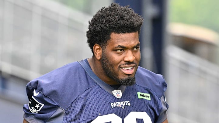 Jun 9, 2025; Foxborough, MA, USA; New England Patriots defensive tackle Joshua Farmer (92) walks to the practice fields at Gillette Stadium. Mandatory Credit: Eric Canha-Imagn Images