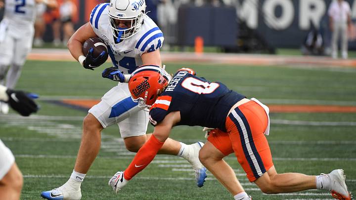 Sep 12, 2026; Champaign, Illinois, USA; Duke Blue Devils tight end Nate kurisky (44) eludes the tackle of Illinois Fighting Illini defensive back Mac Resetich (0) during the second half at Gies Memorial Stadium. Mandatory Credit: Ron Johnson-Imagn Images Sep 12, 2026; Champaign, Illinois, USA; Duke Blue Devils tight end Nate kurisky (44) eludes the tackle of Illinois Fighting Illini defensive back Mac Resetich (0) during the second half at Gies Memorial Stadium. Mandatory Credit: Ron Johnson-Imagn Images