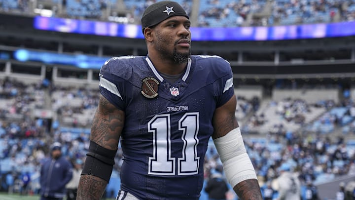 Dec 15, 2024; Charlotte, North Carolina, USA; Dallas Cowboys linebacker Micah Parsons (11) walks onto the field during the first quarter against the Carolina Panthers at Bank of America Stadium. Mandatory Credit: Jim Dedmon-Imagn Images