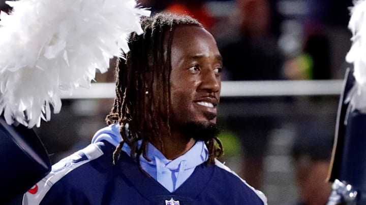 Tennessee Titan's player L'Jarius Sneed stands on the sidelines as the Blackman band takes the field before the start of the football game between Blackman and Oakland at Blackman on Friday, Sept 26, 2025.