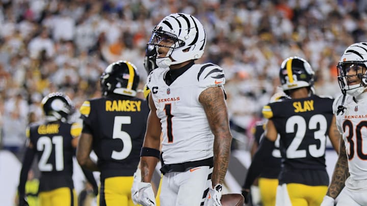 Oct 16, 2025; Cincinnati, Ohio, USA; Cincinnati Bengals wide receiver Ja'Marr Chase (1) acknowledges the crowd with running back Chase Brown (30) after scoring a touchdown against the Pittsburgh Steelers during the second quarter at Paycor Stadium. Mandatory Credit: Katie Stratman-Imagn Images