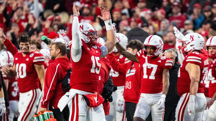 Nebraska quarterback Dylan Raiola (15) hypes up the home crowd at the end of the third quarter against the Wisconsin Badgers. Nebraska quarterback Dylan Raiola (15) hypes up the home crowd at the end of the third quarter against the Wisconsin Badgers.