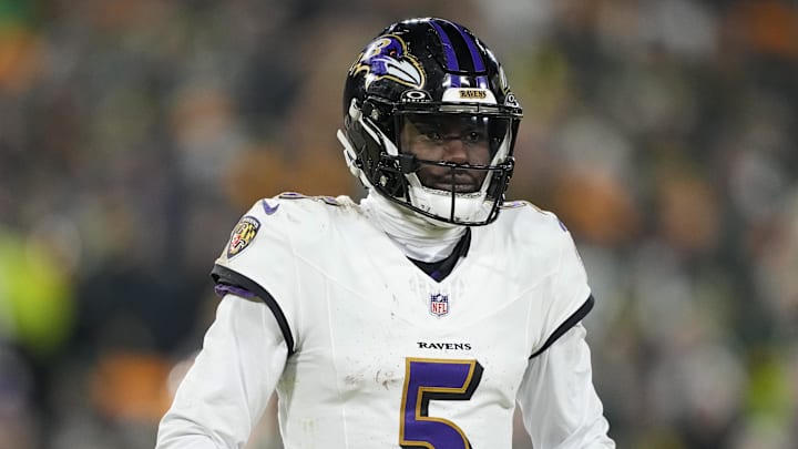 Dec 27, 2025; Green Bay, Wisconsin, USA;  Baltimore Ravens quarterback Tyler Huntley (5) during the game against the Green Bay Packers at Lambeau Field. Mandatory Credit: Jeff Hanisch-Imagn Images