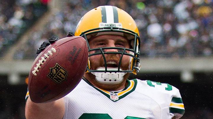 Green Bay Packers fullback John Kuhn (30) celebrates after scoring a touchdown against the Oakland Raiders in 2015.