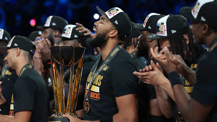 Dec 16, 2025; Las Vegas, Nevada, USA; New York Knicks center/forward Karl-Anthony Towns (32) holds the the Emirates NBA Cup trophy after victory over the San Antonio Spurs at T-Mobile Arena. Mandatory Credit: Kirby Lee-Imagn Images Dec 16, 2025; Las Vegas, Nevada, USA; New York Knicks center/forward Karl-Anthony Towns (32) holds the the Emirates NBA Cup trophy after victory over the San Antonio Spurs at T-Mobile Arena. Mandatory Credit: Kirby Lee-Imagn Images