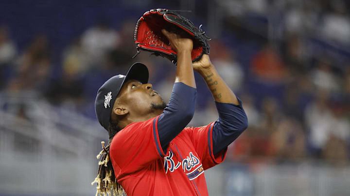 Jun 21, 2025; Miami, Florida, USA;  Atlanta Braves relief pitcher Rafael Montero (48) reacts after defeating the Miami Marlins following the ninth inning at loanDepot Park.