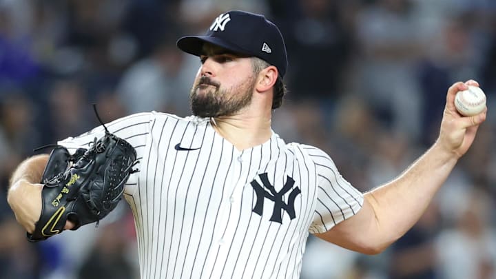 Oct 7, 2025; Bronx, New York, USA; New York Yankees starting pitcher Carlos Rodon (55) pitches against the Toronto Blue Jays in the first inning during game three of the ALDS round for the 2025 MLB playoffs at Yankee Stadium. Mandatory Credit: Wendell Cruz-Imagn Images