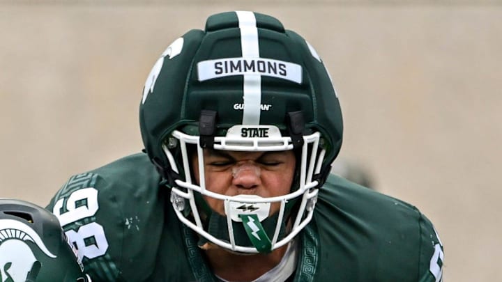 Michigan State's Derrick Simmons, top, stops Cam Fancher during the football Spring Showcase on Saturday, April 18, 2026, at Spartan Stadium in East Lansing. Michigan State's Derrick Simmons, top, stops Cam Fancher during the football Spring Showcase on Saturday, April 18, 2026, at Spartan Stadium in East Lansing.
