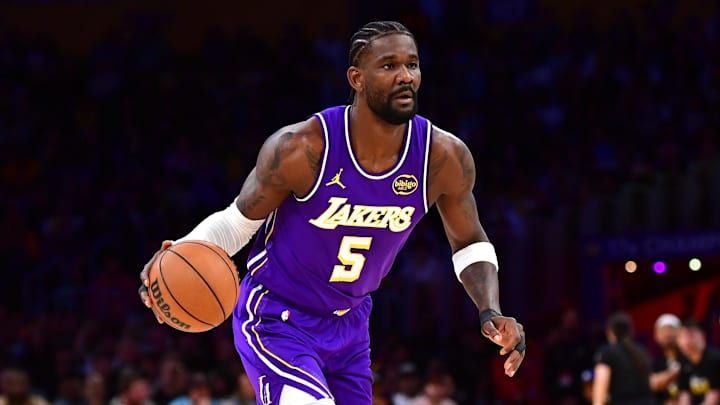 Apr 29, 2026; Los Angeles, California, USA; Los Angeles Lakers center Deandre Ayton (5) moves the ball against the Houston Rockets during the first half in game five of the first round of the 2026 NBA Playoffs at Crypto.com Arena. Mandatory Credit: Gary A. Vasquez-Imagn Images