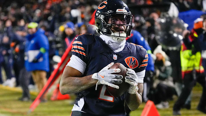 Jan 10, 2026; Chicago, IL, USA;  Chicago Bears wide receiver DJ Moore (2) makes the eventual game winning touchdown catch against the Green Bay Packers during the second half of an NFC Wild Card Round game at Soldier Field.