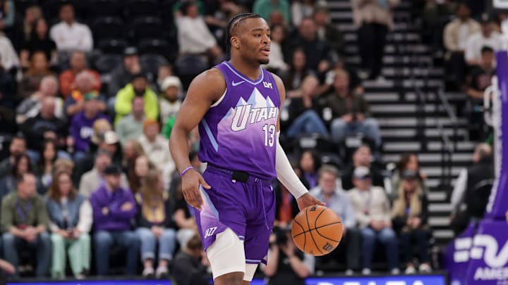 Mar 17, 2025; Salt Lake City, Utah, USA;  Utah Jazz guard Isaiah Collier (13) controls the ball during the first quarter against the Chicago Bulls at Delta Center. Mandatory Credit: Chris Nicoll-Imagn Images