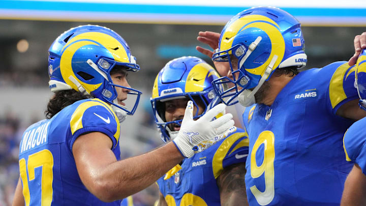 Dec 8, 2024; Inglewood, California, USA; Los Angeles Rams wide receiver Puka Nacua (17) celebrates with quarterback Matthew Stafford (9) and running back Kyren Williams (23) after scoring on a 4-yard touchdown run in the second quarter against the Buffalo Bills at SoFi Stadium. Mandatory Credit: Kirby Lee-Imagn Images