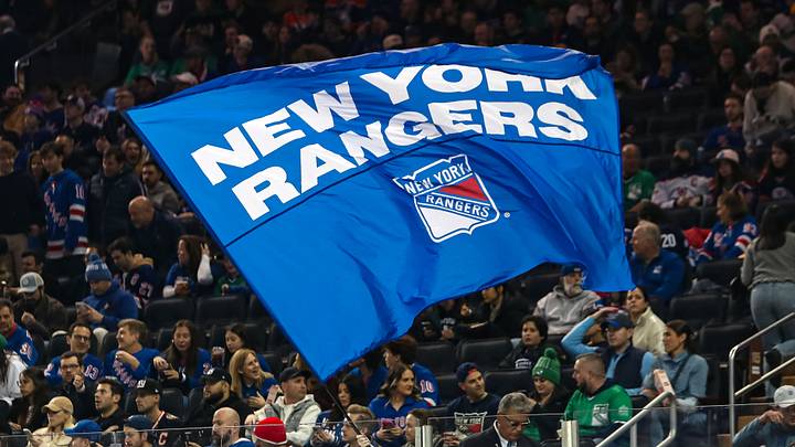 Mar 16, 2025; New York, New York, USA; A New York Rangers flag is seen in the crown during the first period against the Edmonton Oilers at Madison Square Garden. Mar 16, 2025; New York, New York, USA; A New York Rangers flag is seen in the crown during the first period against the Edmonton Oilers at Madison Square Garden.