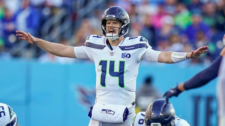 Seattle Seahawks quarterback Sam Darnold (14) calls to teammates on a third-down play during the third quarter against the Seattle Seahawks at Nissan Stadium in Nashville, Tenn., Sunday, Nov. 23, 2025.