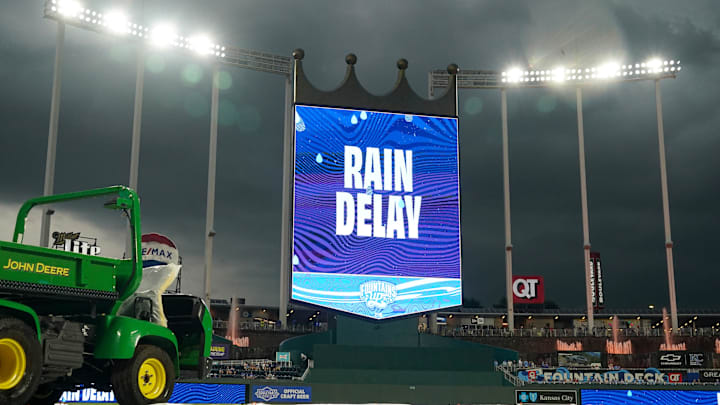 Jul 11, 2025; Kansas City, Missouri, USA; A general view of the field with tarp on during a rain delay prior to a game between the Kansas City Royals and New York Mets at Kauffman Stadium. Mandatory Credit: Denny Medley-Imagn Images