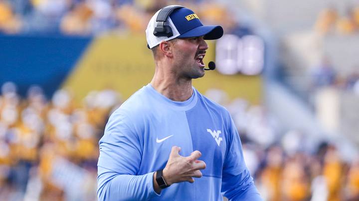 Sep 13, 2025; Morgantown, West Virginia, USA; West Virginia Mountaineers defensive coordinator  Zac Alley reacts during the third quarter against the Pittsburgh Panthers at Milan Puskar Stadium. Mandatory Credit: Ben Queen-Imagn Images