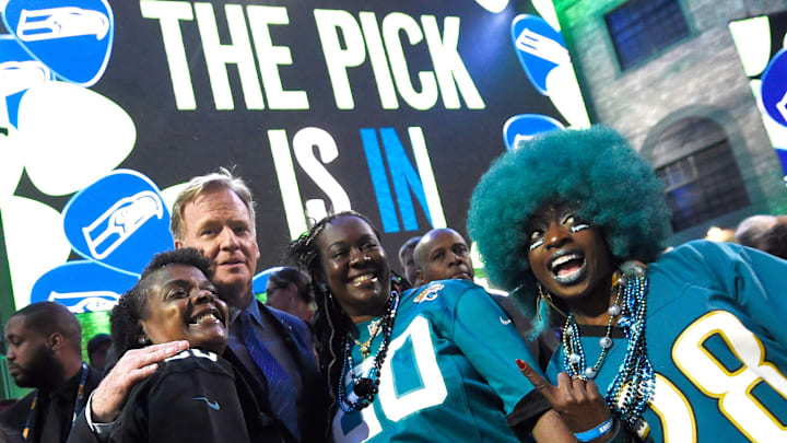 NFL Commisioner Roger Goodell poses with Jaguars fans during the first round of the NFL Draft Thursday, April 25, 2019, in Nashville, Tenn.