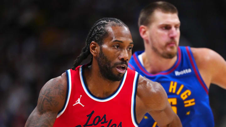 May 3, 2025; Denver, Colorado, USA; LA Clippers forward Kawhi Leonard (2) controls the ball in the first quarter against the Denver Nuggets during game seven of first round for the 2025 NBA Playoffs at Ball Arena. Mandatory Credit: Ron Chenoy-Imagn Images May 3, 2025; Denver, Colorado, USA; LA Clippers forward Kawhi Leonard (2) controls the ball in the first quarter against the Denver Nuggets during game seven of first round for the 2025 NBA Playoffs at Ball Arena. Mandatory Credit: Ron Chenoy-Imagn Images