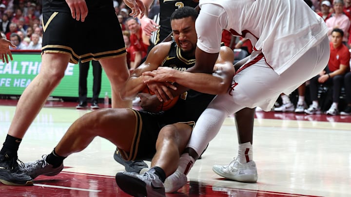 Purdue Boilermakers forward Trey Kaufman-Renn (4) wrestles for the ball