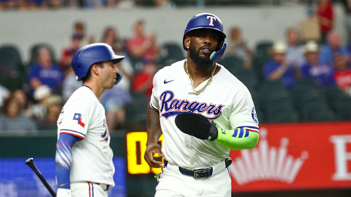 Texas Rangers right fielder Adolis Garcia (53) reacts after scoring during the first inning against the Los Angeles Angels at Globe Life Field. Texas Rangers right fielder Adolis Garcia (53) reacts after scoring during the first inning against the Los Angeles Angels at Globe Life Field.