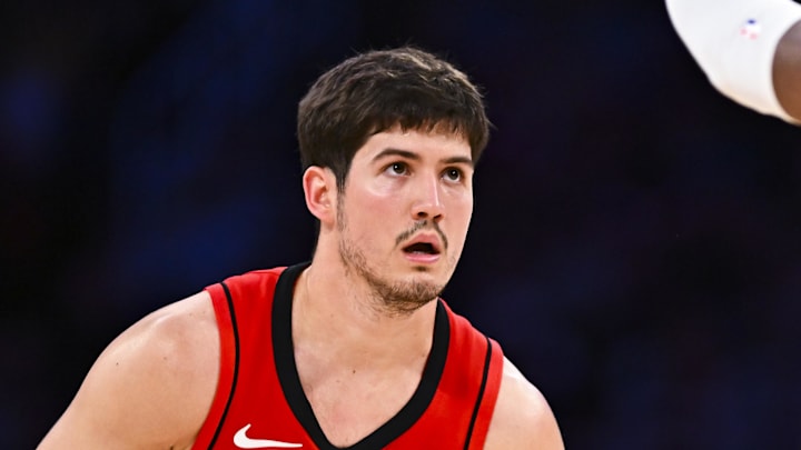 Apr 11, 2025; Los Angeles, California, USA; Houston Rockets guard Reed Sheppard (15) looks to shoot against Los Angeles Lakers forward Rui Hachimura (28) during the second half at Crypto.com Arena. Mandatory Credit: Jonathan Hui-Imagn Images