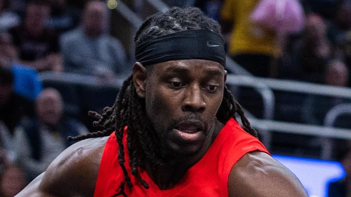 Indiana Pacers guard/forward Aaron Nesmith dribbles the ball as Portland Trail Blazers guard Jrue Holiday defends. Indiana Pacers guard/forward Aaron Nesmith dribbles the ball as Portland Trail Blazers guard Jrue Holiday defends.