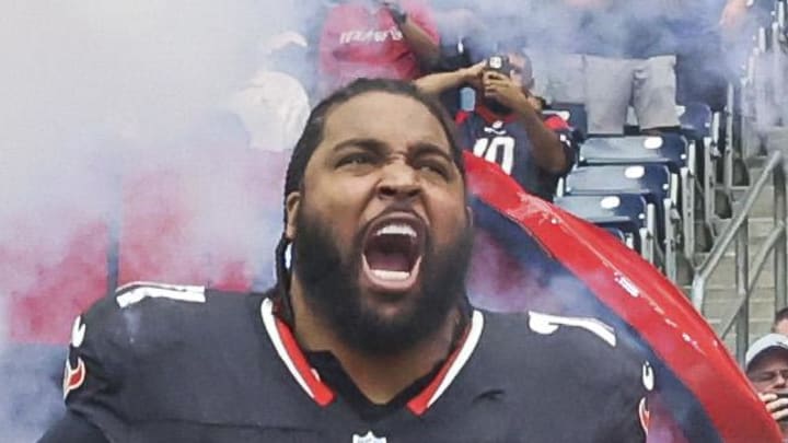 Houston Texans offensive tackle Tytus Howard runs onto the field Houston Texans offensive tackle Tytus Howard runs onto the field