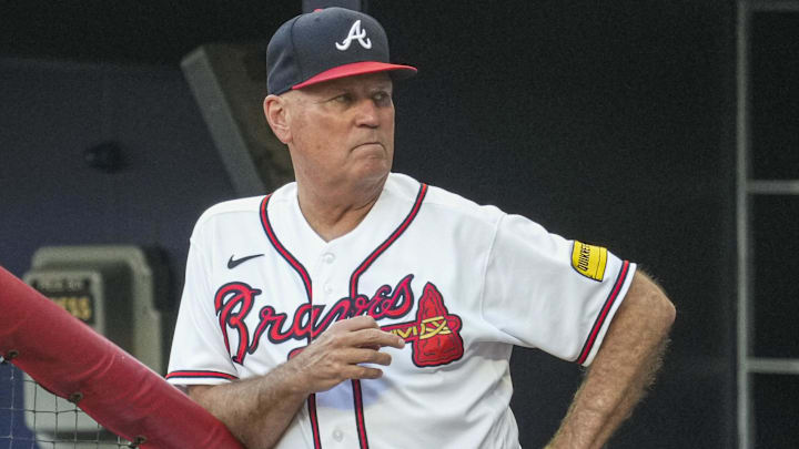 Atlanta Braves manager Brian Snitker (43) is shown in the dugout against the New York Mets during the first inning at Truist Park.