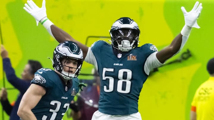Feb 9, 2025; New Orleans, LA, USA; Philadelphia Eagles cornerback Cooper DeJean (33) celebrates with linebacker Jalyx Hunt (58) after returning an interception for a touchdown against the Kansas City Chiefs in the second quarter in Super Bowl LIX at Ceasars Superdome. Mandatory Credit: Mark J. Rebilas-Imagn Images