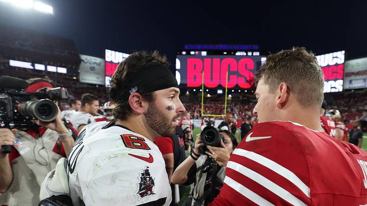 Tampa Bay Buccaneers quarterback Baker Mayfield (6) and San Francisco 49ers quarterback Mac Jones hug following their game. Tampa Bay Buccaneers quarterback Baker Mayfield (6) and San Francisco 49ers quarterback Mac Jones hug following their game.