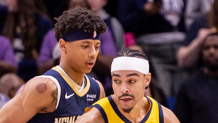 Indiana Pacers guard/forward Andrew Nembhard dribbles against New Orleans Pelicans guard Jeremiah Fears