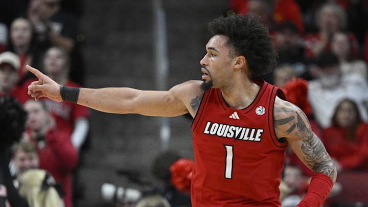 Feb 21, 2026; Louisville, Kentucky, USA;  Louisville Cardinals guard J'vonne Hadley (1) reacts during the first half against the Georgia Tech Yellow Jackets at KFC Yum! Center. Mandatory Credit: Jamie Rhodes-Imagn Images