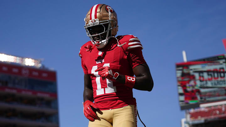 Brandon Aiyuk warms up before big game.