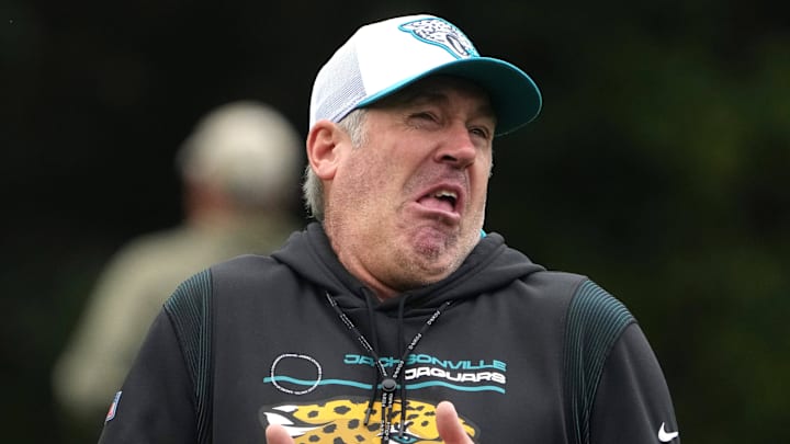 Oct 16, 2024; Watford, United Kingdom; Jacksonville Jaguars coach Doug Pederson reacts during practice at The Grove. Mandatory Credit: Kirby Lee-Imagn Images
