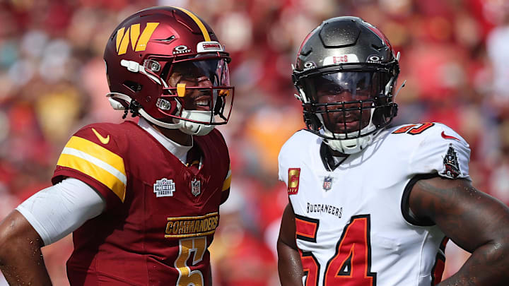 Sep 8, 2024; Tampa, Florida, USA;  Washington Commanders quarterback Jayden Daniels (5) and Tampa Bay Buccaneers linebacker Lavonte David (54) look on during the first half at Raymond James Stadium. Mandatory Credit: Kim Klement Neitzel-Imagn Images