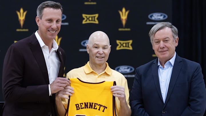 May 7, 2026; Tempe, Arizona, USA; Arizona State Sun Devils basketball head coach Randy Bennett (center) poses for a photo with athletic director Graham Rossini (left) and school president Dr. Michael Crow during an introductory press conference at the Weatherup Center. Mandatory Credit: Mark J. Rebilas-Imagn Images