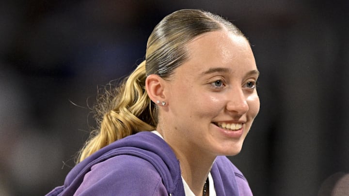 Paige Bueckers looks on during the second quarter between the Dallas Mavericks and the Oklahoma City Thunder. Paige Bueckers looks on during the second quarter between the Dallas Mavericks and the Oklahoma City Thunder.